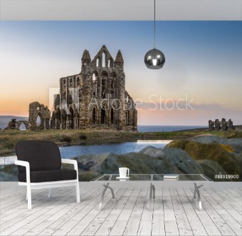 Picture of Stone ruins of Whitby Abbey on the cliffs of Whitby North Yorkshire England at sunset
